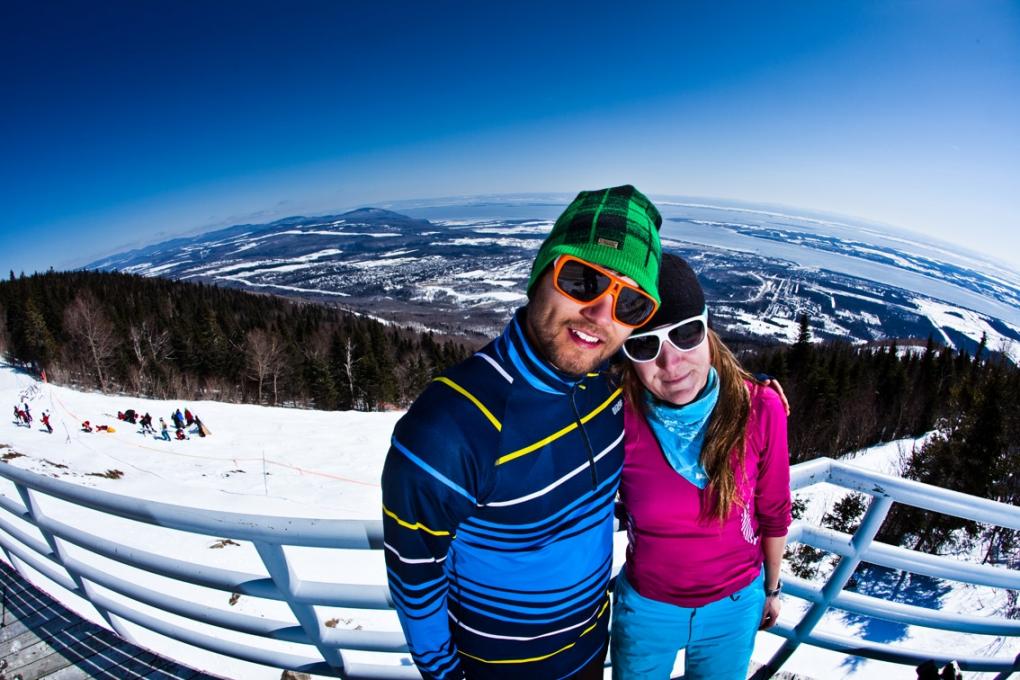 Couple at Mont-Sainte-Anne in spring skiing