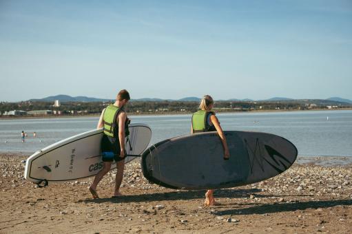 Baie de Beauport - couple with paddle boards